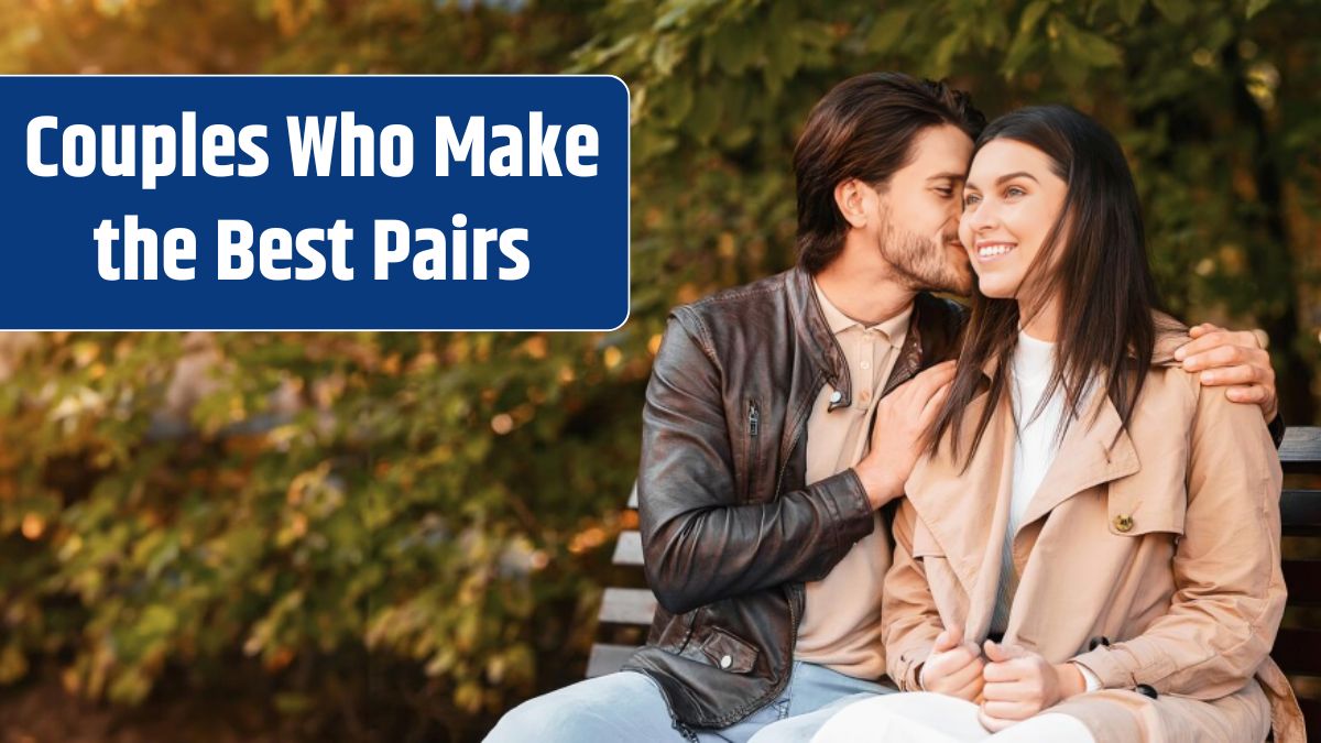 Romantic guy flirting with pretty smiling girlfriend sitting on bench at park.